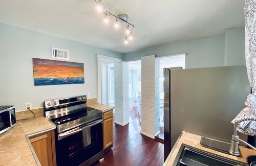 New Smyrna Beach House | UP TO 2 COTTAGES AVAILABLE, PRIVATE POOL, COURTYARD, STEPS FROM FLAGLER AVE.