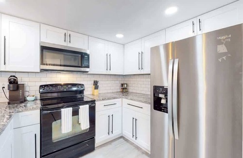 Aurora Hills House | Updated Two + loft Bed with Three King Beds, Loft & Two Baths, Corporate Housing