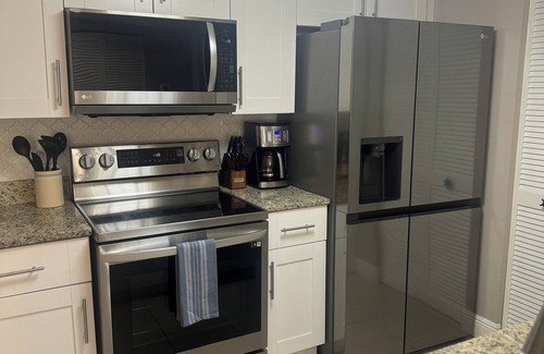 Winkler Condo | Upscale Ground Floor Retreat: Luxury Condo