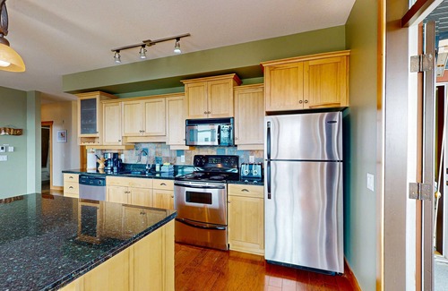 Big White Ski Resort Condo | Upscale ski-in/ski-out condo with private hot tub - hit the slopes with ease