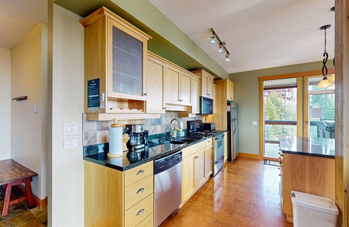 Big White Ski Resort Condo | Upscale ski-in/ski-out condo with private hot tub - hit the slopes with ease