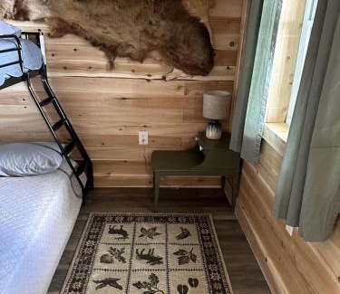 Portage Lake House | Magnificent Cabin Nestled Amidst Trees in Portage Lake, Maine