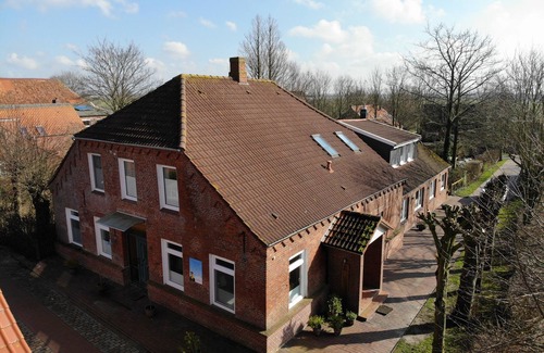 Pilsum Apartment | Vacation apartment "Kleine Möwe" with large garden in the heart of Pilsum