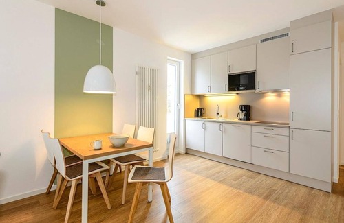 Bensersiel Apartment | Vacation apartment with terrace incl. free use of sauna area & swimming pool