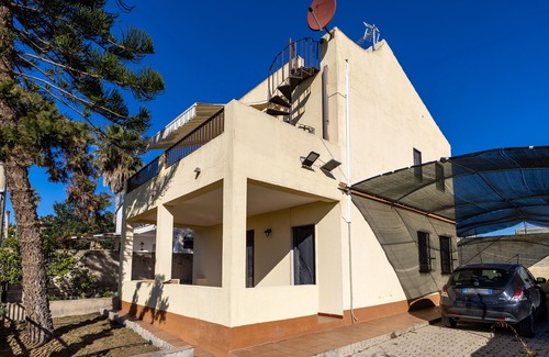 Punta Braccetto House | Vacation Home "Falcon House Punta Braccetto" with Sea View, Private Terrace & Wi-Fi