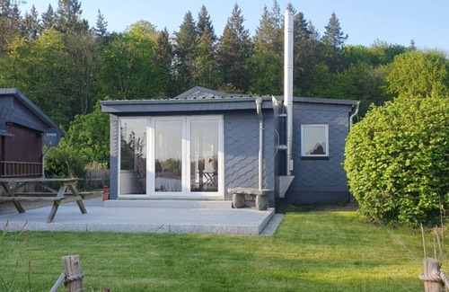 Moelln House | Vacation home Mölln am Ziegelsee bathing jetty swimming fishing boat 3 persons dog