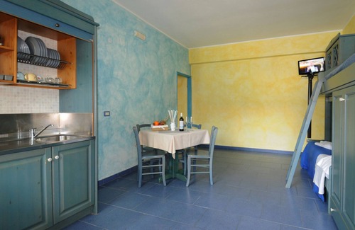 Province of Messina House | Vacation Home "Oasi Azzurra - Bilocale Plus 1" with Sea View, Shared Pool & Shared Terraces