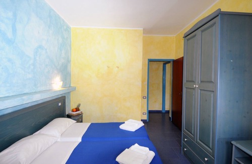 Province of Messina House | Vacation Home "Oasi Azzurra - Bilocale Plus 1" with Sea View, Shared Pool & Shared Terraces