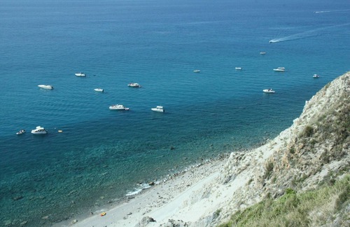 Province of Messina House | Vacation Home "Oasi Azzurra - Bilocale Plus 1" with Sea View, Shared Pool & Shared Terraces