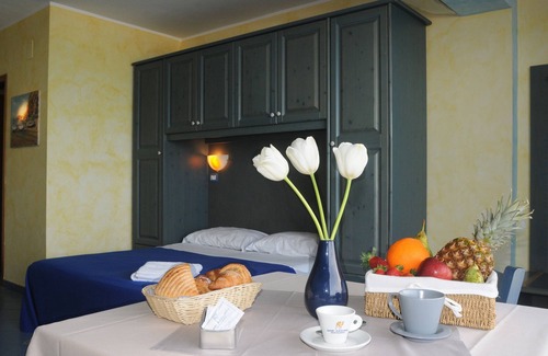 Province of Messina House | Vacation Home "Oasi Azzurra - Monolocale Standard 1" with Shared Pool & Shared Terraces