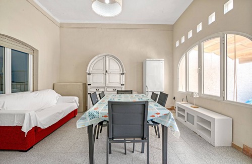 Oliva House | Vacation Home "Oliva Primera Linea" with Sea View, Private Terrace & Wi-Fi