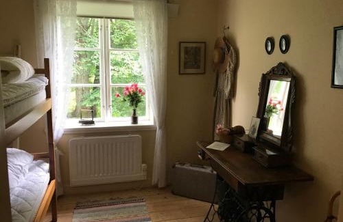 Knatte House | Vandrarhemmet Årås Säteri och Trädgårdar