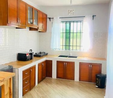 Lindi Apartment | Venem Ensuite bathroom Elephant house