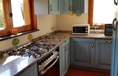 Portobello di Gallura Villa | Villa a short walk from the sea surrounded by a garden with trees, plants and flowers