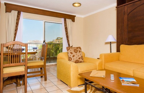 El Medano Ejidal Resort | Villa Del Palmar Beach Resort and Spa One Bedroom Suite Sleeps 4- Cabo San Lucas