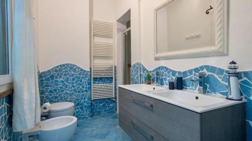 Alghero Villa | Villa Emmeline fronte mare 5 camere 6 bagni infinity pool WiFi per 12 persone