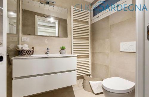 Alghero Villa | Villa Emmeline fronte mare 5 camere 6 bagni infinity pool WiFi per 12 persone