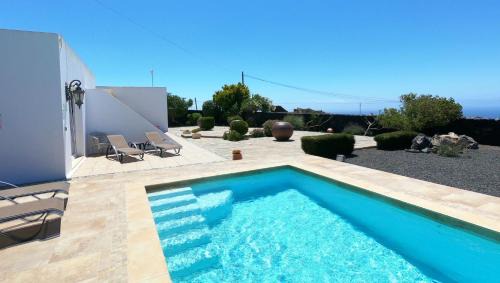 Conil Villa | Villa Essence - a unique detached villa with A-C, heated private pool, hottub, gardens, patios and stunning views!