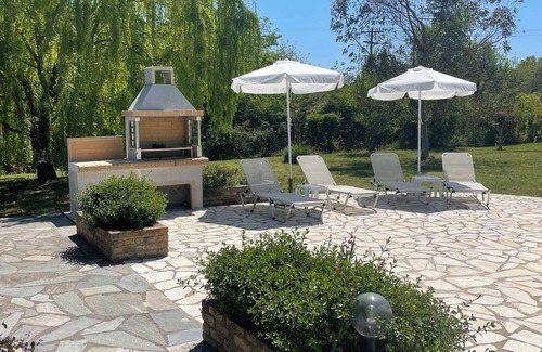 Ano Korakiana Villa | Village View’ is a beautifully built two-bedroomed villa for a relaxing holiday