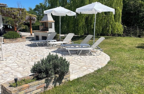 Ano Korakiana Villa | Village View’ is a beautifully built two-bedroomed villa for a relaxing holiday