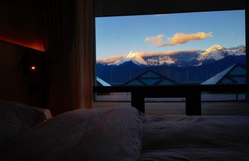 Deqen County Hotel | Wake Up In Snow Capped Peaks