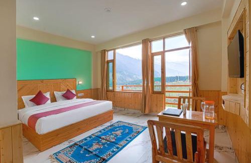 Old Manali Hotel | Wander Nest Manali Luxurious rooms with mountain peaks and waterfall view