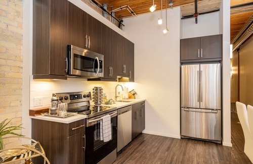 Exchange District Condo | Warehouse Loft in Exchange District w/Parking!
