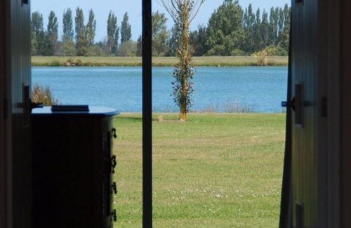 Huntingdon House | Warm and peaceful with unobstructed lake views.