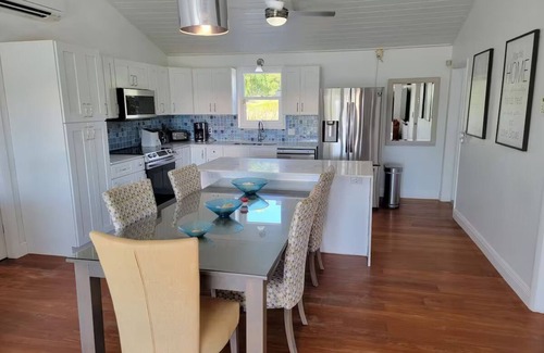 Discovery Bay Villa | Waterfront 3BR Villa w/Pool, Parking & Private Patio