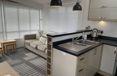 Hamworthy House | Water Lily lovely dog friendly caravan on Rockley Park, Poole Harbour + Sea View
