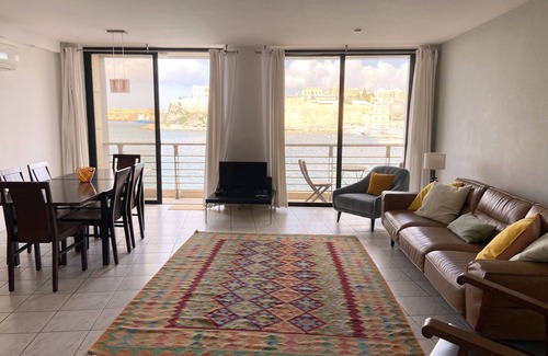 Birgu Apartment | Water's edge apartment with stunning 180 degree historic harbour views