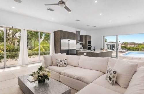 Leeward Settlement House | Waterfront Luxury Villa with Optional Boat and Beach Access Just Steps Away