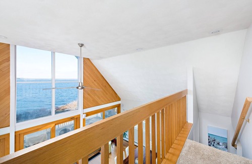 Jamestown Shores House | Waterfront A-frame Chalet with shore beach overlooking Narragansett Bay