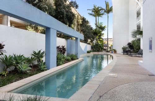 Minyama Apartment | Waterfront Elegance with Pool & Jetty Access