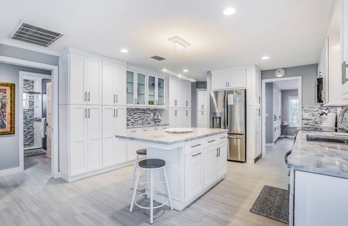 Yacht Club House | Waterfront escape in the heart of the action with pool, spa, grill, & WiFi