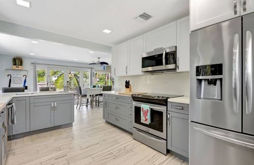 Anglers Park House | Waterfront Home 3/2.5,HotTub,2Sup,4Kayaks,Golf Car