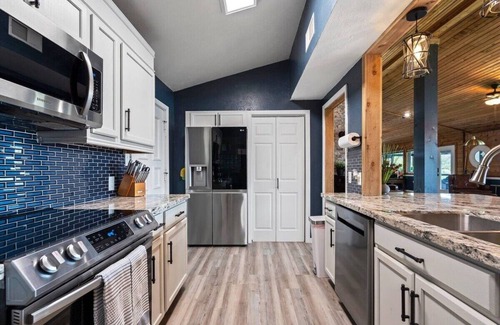 Highlands House | Waterfront Home with Boat Launch and Dock, Pool & basketball/pickleball court mini golf, playground
