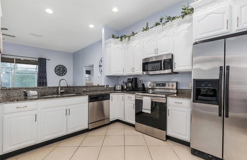Cape Coral House | Waterfront Paradise with Heated Pool, Kayaks, & Game Room - Villa Cape Paradise- Roelens Vacations