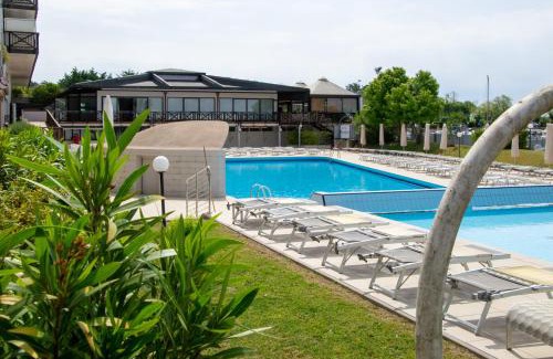 Lignano Riviera Apartment | Welc-ōM Lignano swim and fun with dock view