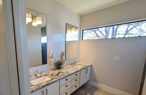 MLK House | Welcome to East Austins Cactus House! Private Stock Tank Pool + Hot Tub