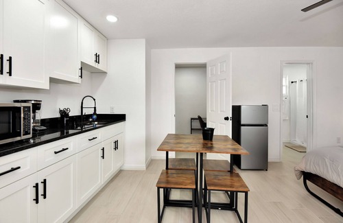 Daytona Beach Shores Hotel | Welcome to your cozy retreat in Daytona Shores, just steps from the Atlantic Ocean. Perfect for solo travelers or couples, this comfy motel studio offers easy beach access and is surrounded by great local restaurants and cafés.