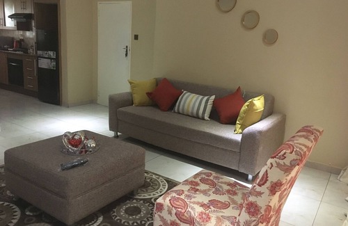 Greendale Apartment | Well secured 3 bedroom apartment, clean and neat with a beautiful garden