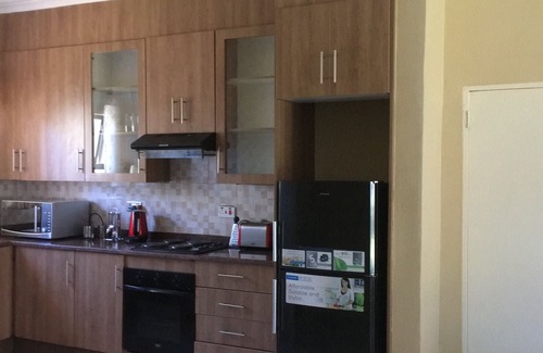 Greendale Apartment | Well secured 3 bedroom apartment, clean and neat with a beautiful garden
