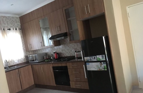 Greendale Apartment | Well secured 3 bedroom apartment, clean and neat with a beautiful garden