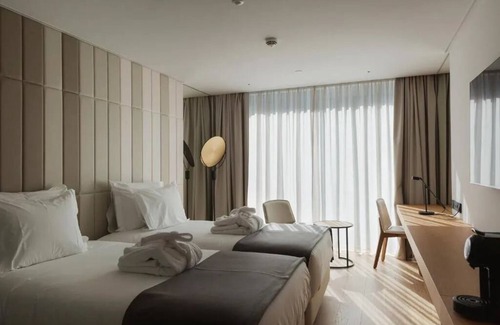 Sao Jorge de Arroios Hotel | Where Light Dances & Pools Sparkle—Heart of Lisbon Adventures