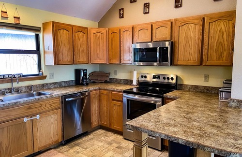 Warsaw House | Whole house on a quiet cove, Lake of the Ozarks, Family owned and operated.