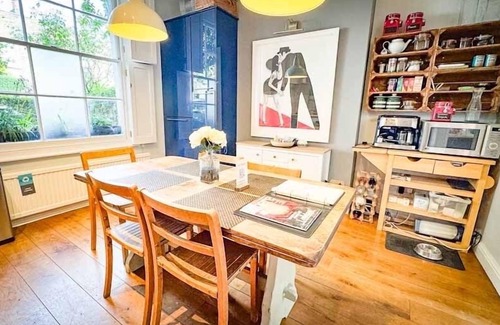 Haverstock House | Why rent a flat? Stay in a historic Victorian Cottage w/Private walled Garden
