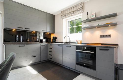 Eilsum House | Wind in den Bäumen