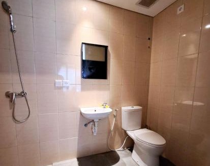 By Pass Ngurah Rai Apartment | Wisman House by Pigeon