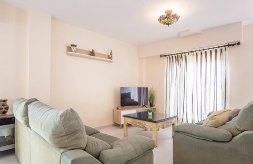 Tavernes de la Valldigna Apartment | With a great sea view from the terrace awaits you this spacious apartment near the beach of Tavernes